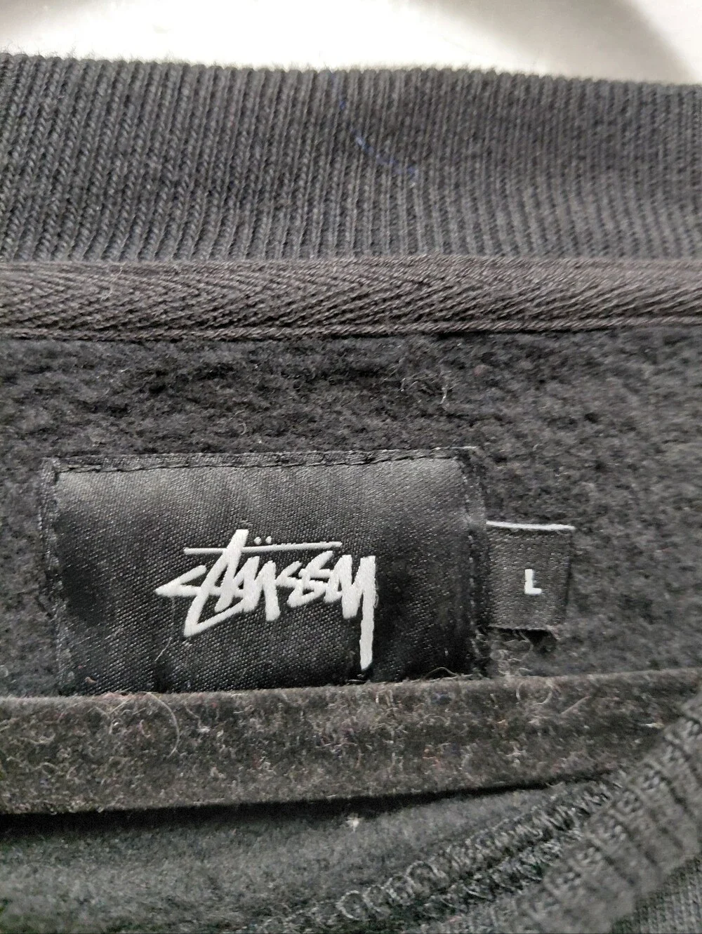Stussy Black Crewneck Sweatshirt with White Logo Tag